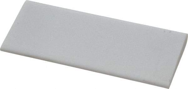 Norton - 4" Long x 1-3/4" Diam x 3/8" Thick, Novaculite Sharpening Stone - Round, Ultra Fine Grade - Caliber Tooling