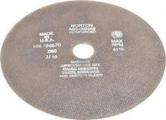 Norton - 10" 60 Grit Aluminum Oxide Cutoff Wheel - 0.06" Thick, 1-1/4" Arbor, 6,110 Max RPM, Use with Stationary Grinders - Caliber Tooling