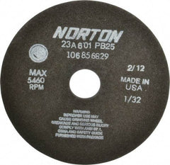 Norton - 7" 60 Grit Aluminum Oxide Cutoff Wheel - 1/32" Thick, 1-1/4" Arbor, 5,460 Max RPM, Use with Stationary Grinders - Caliber Tooling