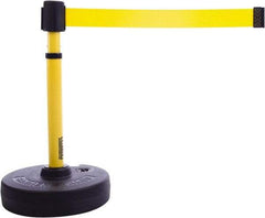 Banner Stakes - 22 to 42" High, 2-3/8" Pole Diam, Barrier Post Base & Stanchion - 9" Base Diam, Round Nylon Base, Yellow Plastic Post, 15' x 2-1/2" Tape, For Outdoor Use - Caliber Tooling