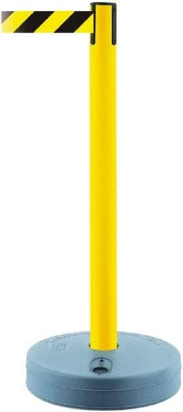 Tensator - 38" High, 2-1/2" Pole Diam, Barricade Tape Dispenser - 14" Base Diam, Round Plastic Base, Yellow Polymer Post, 7-1/2' x 1-7/8" Tape, Single Line Tape, For Outdoor Use - Caliber Tooling