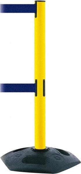 Tensator - 38" High, 2-1/2" Pole Diam, 4 Way Stanchion - 19" Base Diam, Octagon Recycled Rubber Base, Yellow Plastic Post, 7-1/2' x 2" Tape, Dual Line Tape, For Outdoor Use - Caliber Tooling