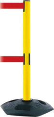 Tensator - 38" High, 2-1/2" Pole Diam, 4 Way Stanchion - 19" Base Diam, Octagon Recycled Rubber Base, Yellow Plastic Post, 13' x 2" Tape, Dual Line Tape, For Outdoor Use - Caliber Tooling