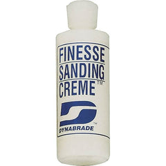 Dynabrade - 4 oz Sanding Creme Compound - Compound Grade Fine, White, For High Glossing, Use on Composites, Fiberglass & Metal - Caliber Tooling