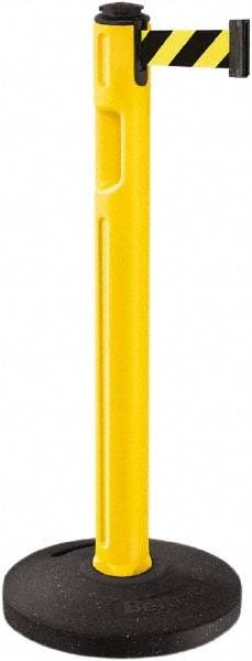 Lavi Industries - 38-1/4" High, 3-1/4" Pole Diam, Stanchion - 16" Base Diam, Dome Recycled Rubber Base, Yellow Plastic Post, 12' x 2" Tape, Single Line Tape, For Outdoor Use - Caliber Tooling