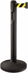 Lavi Industries - 38-1/4" High, 3-1/4" Pole Diam, Stanchion - 16" Base Diam, Dome Recycled Rubber Base, Black Plastic Post, 12' x 2" Tape, Single Line Tape, For Outdoor Use - Caliber Tooling