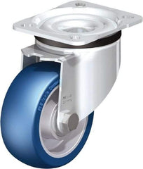 Blickle - 4" Diam x 1-37/64" Wide x 5-7/64" OAH Top Plate Mount Swivel Caster - Polyurethane-Elastomer Blickle Besthane, 660 Lb Capacity, Ball Bearing, 3-15/16 x 3-3/8" Plate - Caliber Tooling