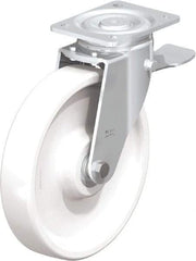 Blickle - 10" Diam x 1-31/32" Wide x 11-39/64" OAH Top Plate Mount Swivel Caster with Brake - Impact-Resistant Nylon, 1,980 Lb Capacity, Ball Bearing, 5-1/2 x 4-3/8" Plate - Caliber Tooling