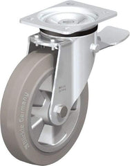 Blickle - 8" Diam x 1-31/32" Wide x 9-41/64" OAH Top Plate Mount Swivel Caster with Brake - Solid Rubber, 1,100 Lb Capacity, Ball Bearing, 5-1/2 x 4-3/8" Plate - Caliber Tooling