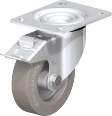 Blickle - 5" Diam x 1-37/64" Wide x 6-7/64" OAH Top Plate Mount Swivel Caster with Brake - Solid Rubber, 550 Lb Capacity, Ball Bearing, 5-1/2 x 4-3/8" Plate - Caliber Tooling