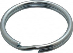 Made in USA - 1.396" ID, 1.64" OD, 0.168" Thick, Split Ring - Grade 2 Spring Steel, Zinc-Plated Finish - Caliber Tooling